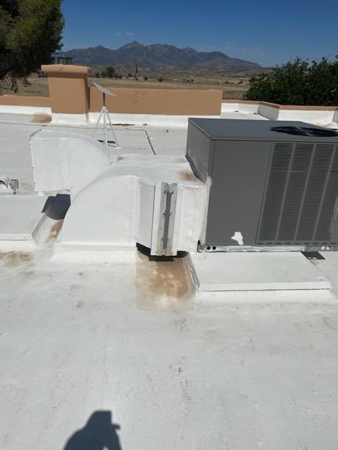 Severely weathered flat roof before coating in Tucson